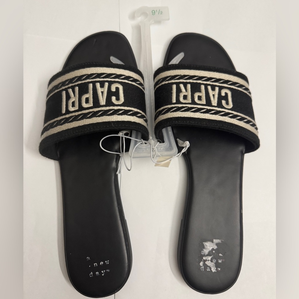 Capri slide black ivory flat sandal